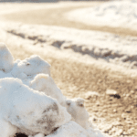 snow packed on asphalt