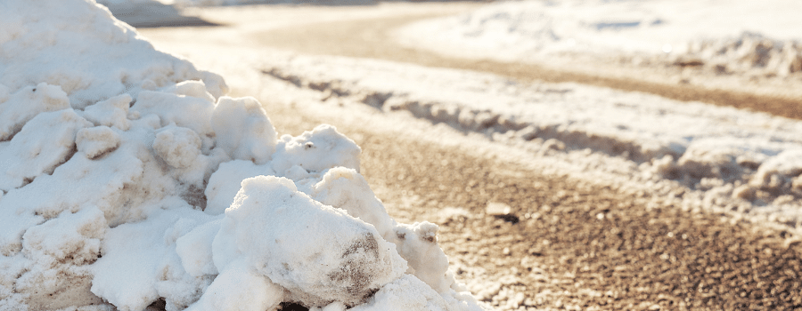snow packed on asphalt