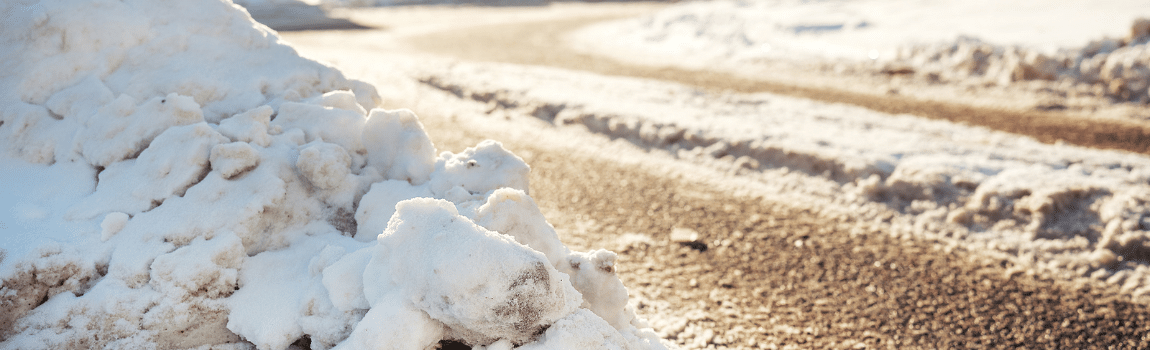 snow packed on asphalt