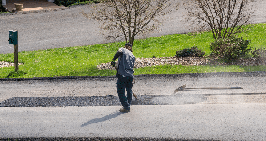man working on asphalt