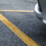 up close parking lot with parked car