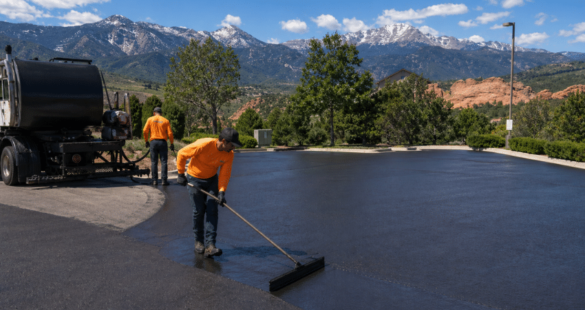 crew sealcoating asphalt in Colorado Springs