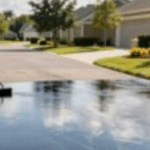 Men sealcoating driveway